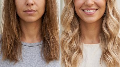 A woman with wispy 'Soft Girl' curtain bangs and internal layers for a feminine, youthful look, ideal for brunch or casual outings. Styled using ceramic thermal rollers for a subtle bend and a leave-in conditioner for light moisture.