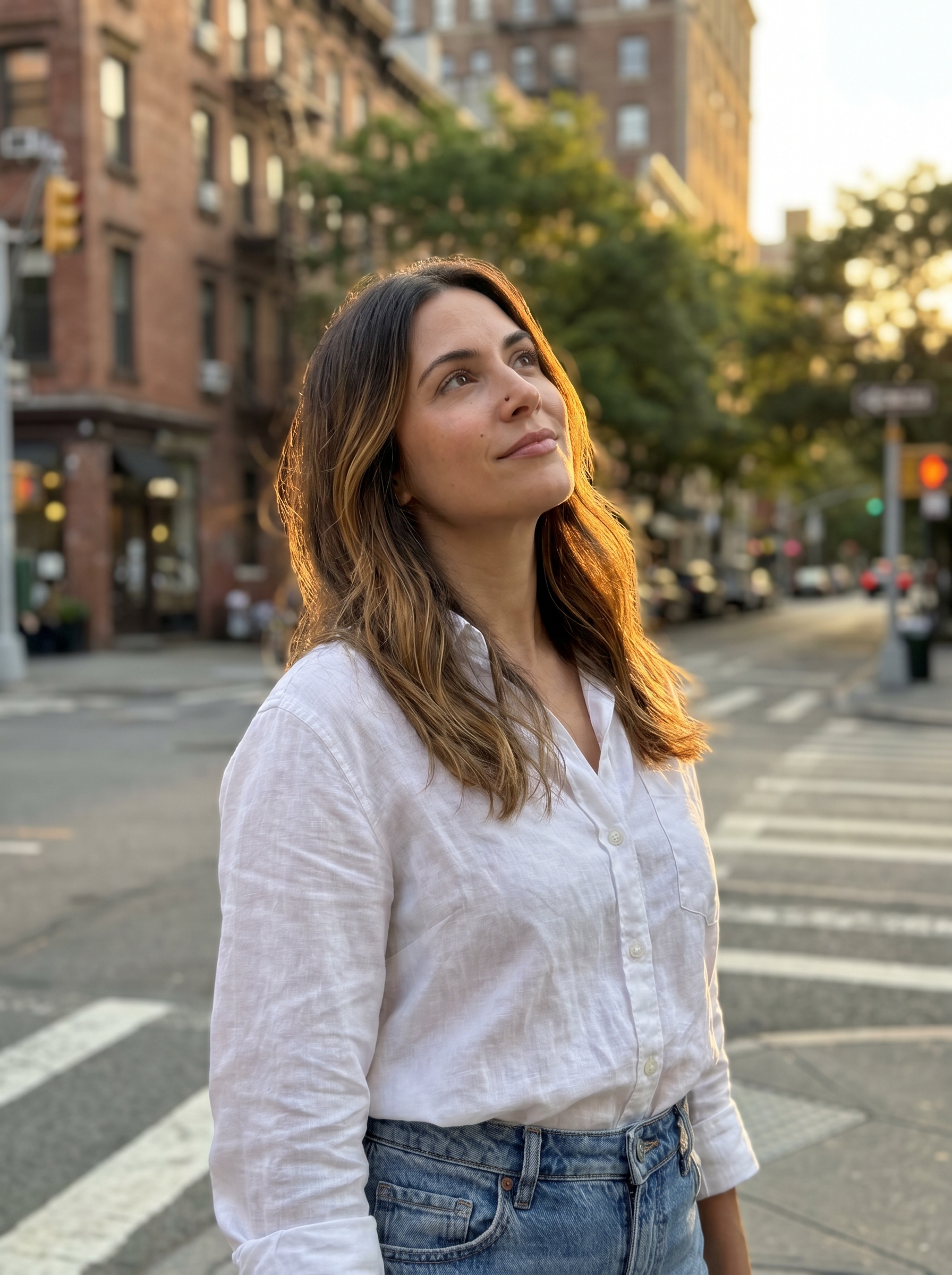 Natural golden balayage summer 2026 with 'Honey-Dipped Brunette Balayage,' combining dark brown, honey blonde, and amber for subtle elegance.
