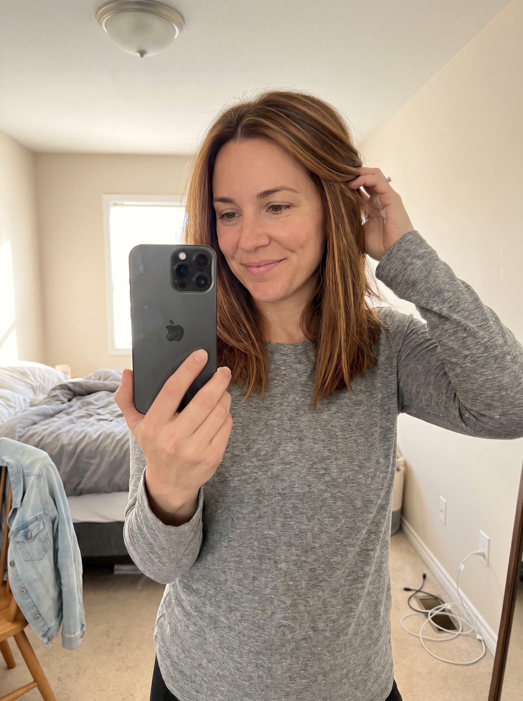 Luxurious Amber-Infused 'Candlelight' Brunette subtle highlights summer hair 2026, adding warmth and natural beauty with deep brown, amber, and soft copper tones.