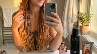 Romantic apricot crush highlighted baby braids on light blonde hair, featuring subtle copper tones. A whimsical and ethereal idea for summer hair ideas for blondes.