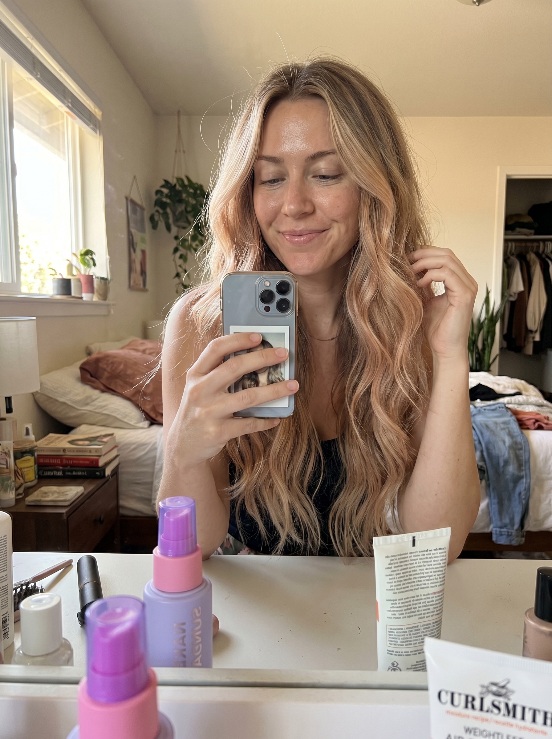 Invisible Layered Long Waves in Linen Blonde, a romantic and effortless look for summer haircuts inspiration 2026. This natural style uses wave enhancing cream and salt spray for beachy texture, ideal for everyday wear.