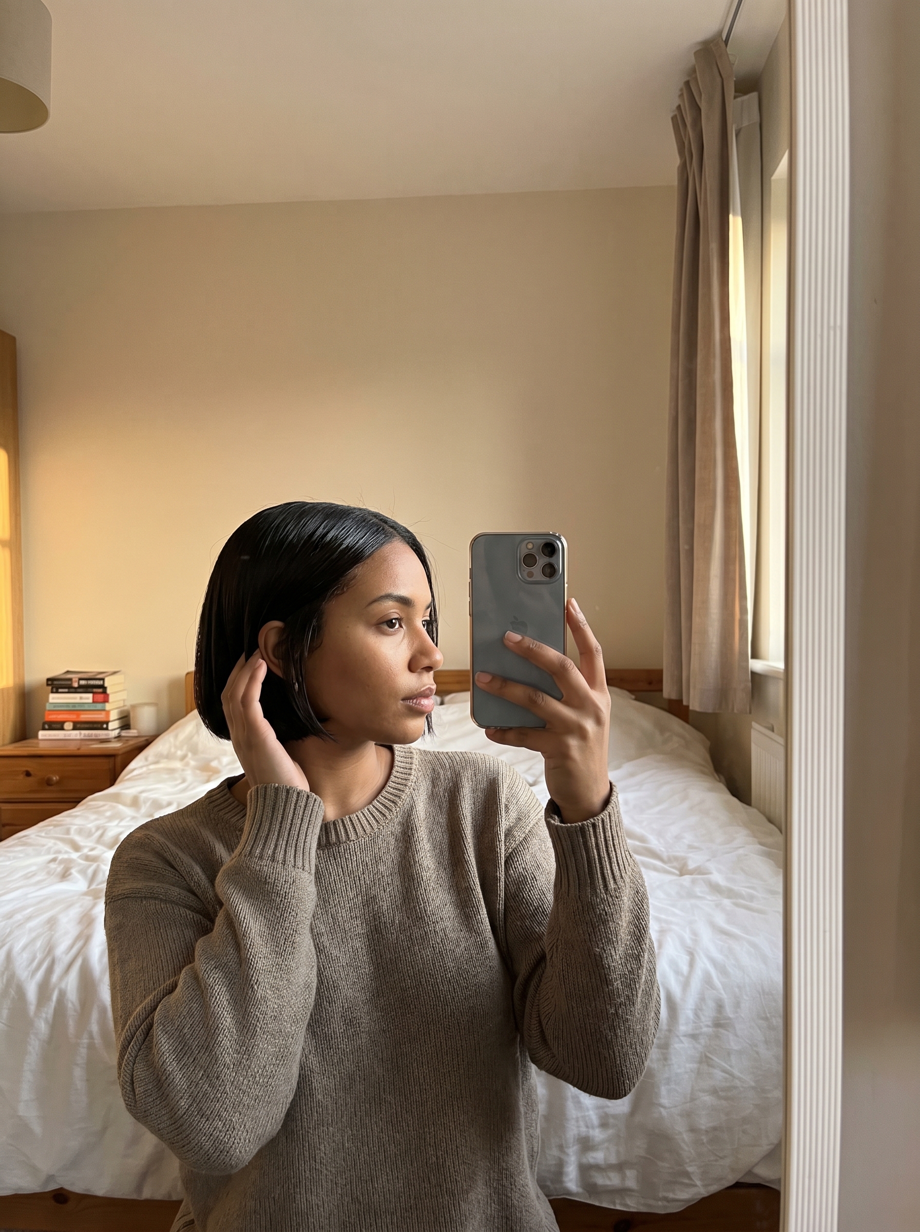 Sleek Hydro-Bob in Midnight Espresso, a bold top summer hairstyle 2026 for work, date nights, or special events, with a perpetually damp look.