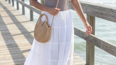 White cotton gauze maxi skirt with a taupe ribbed tank top, gold sandals, and layered necklaces, great vacation outfits summer.