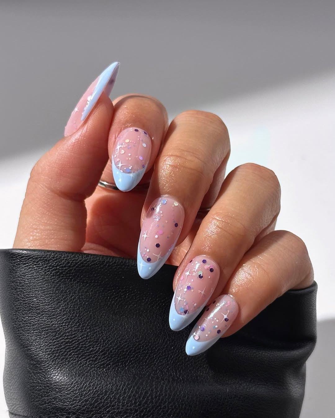 Baby Blue French Tips with Glitter Confetti Oval Nails