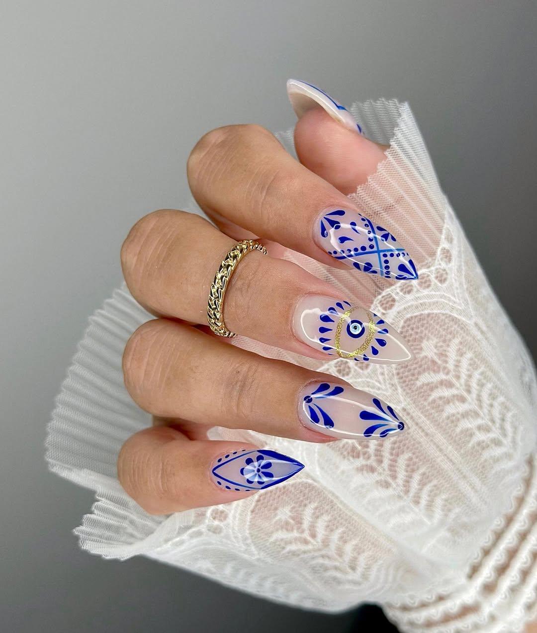 Blue Porcelain Evil Eye Clear Stiletto Nails