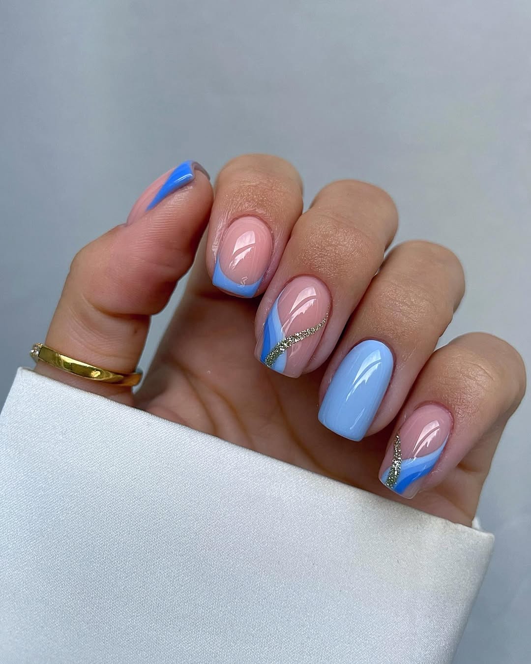 Blue Waves and Gold Glitter Short Squoval Nails