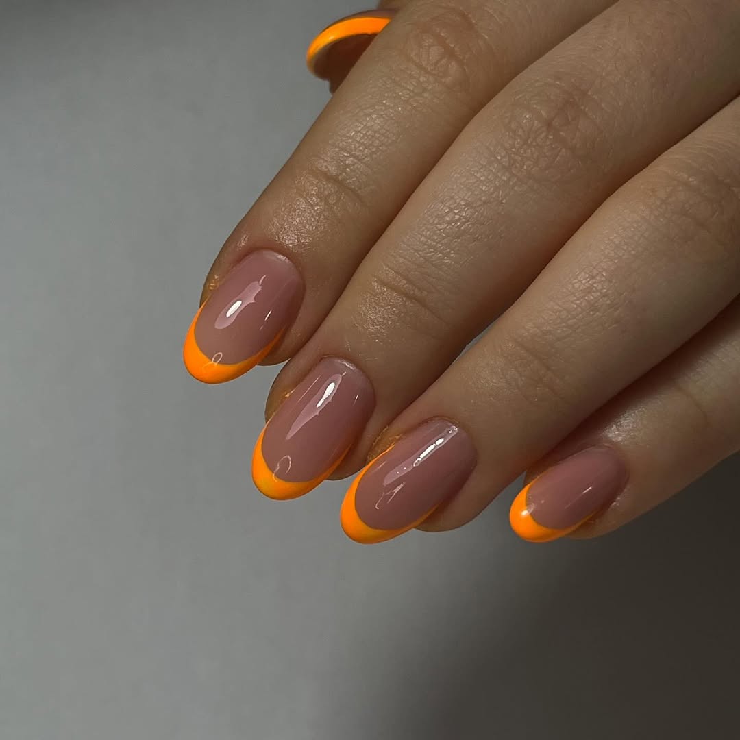Bright Orange Glossy French Tip Oval Nails