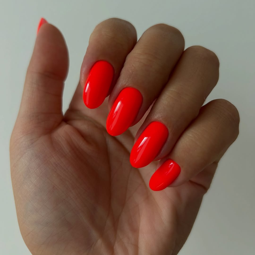 Bright Tangerine Glossy Oval Nails