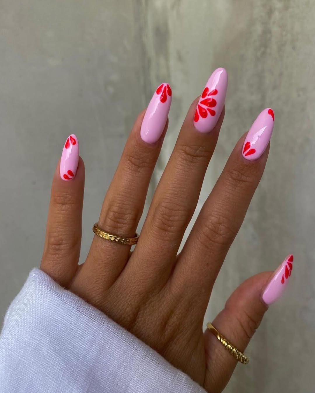Bubblegum Pink Glossy Nails With Red Floral Petals