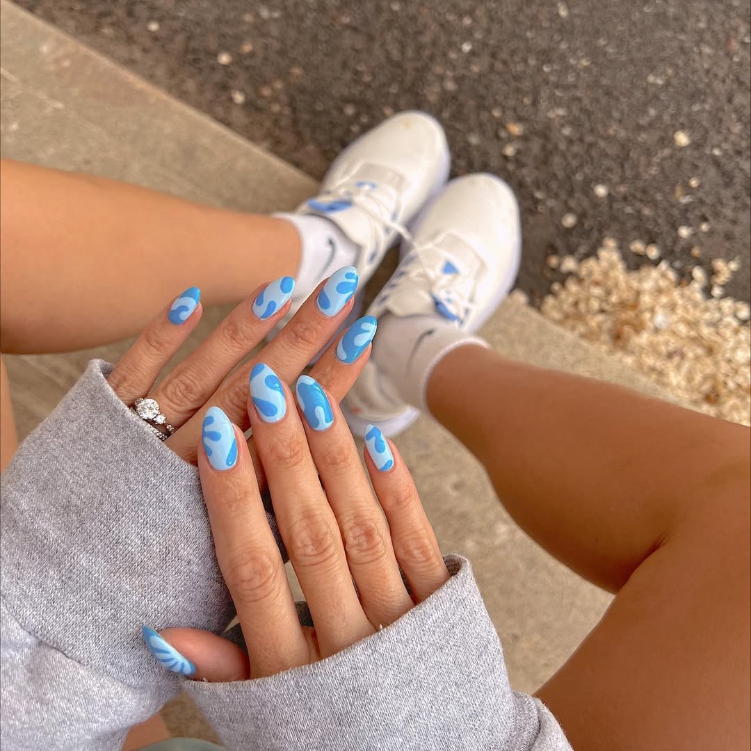 Cerulean Blue Swirls Almond Nails