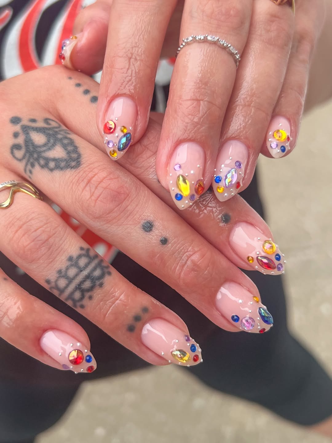 Clear Nude Almond Nails With Colorful Rhinestones