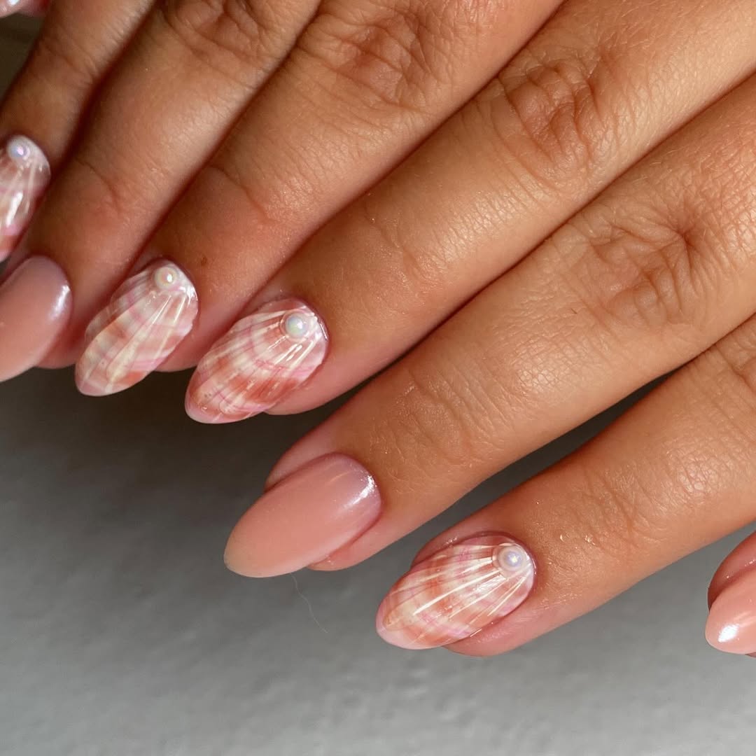 Coastal Chic Seashell Nail Art with Pearl Accents