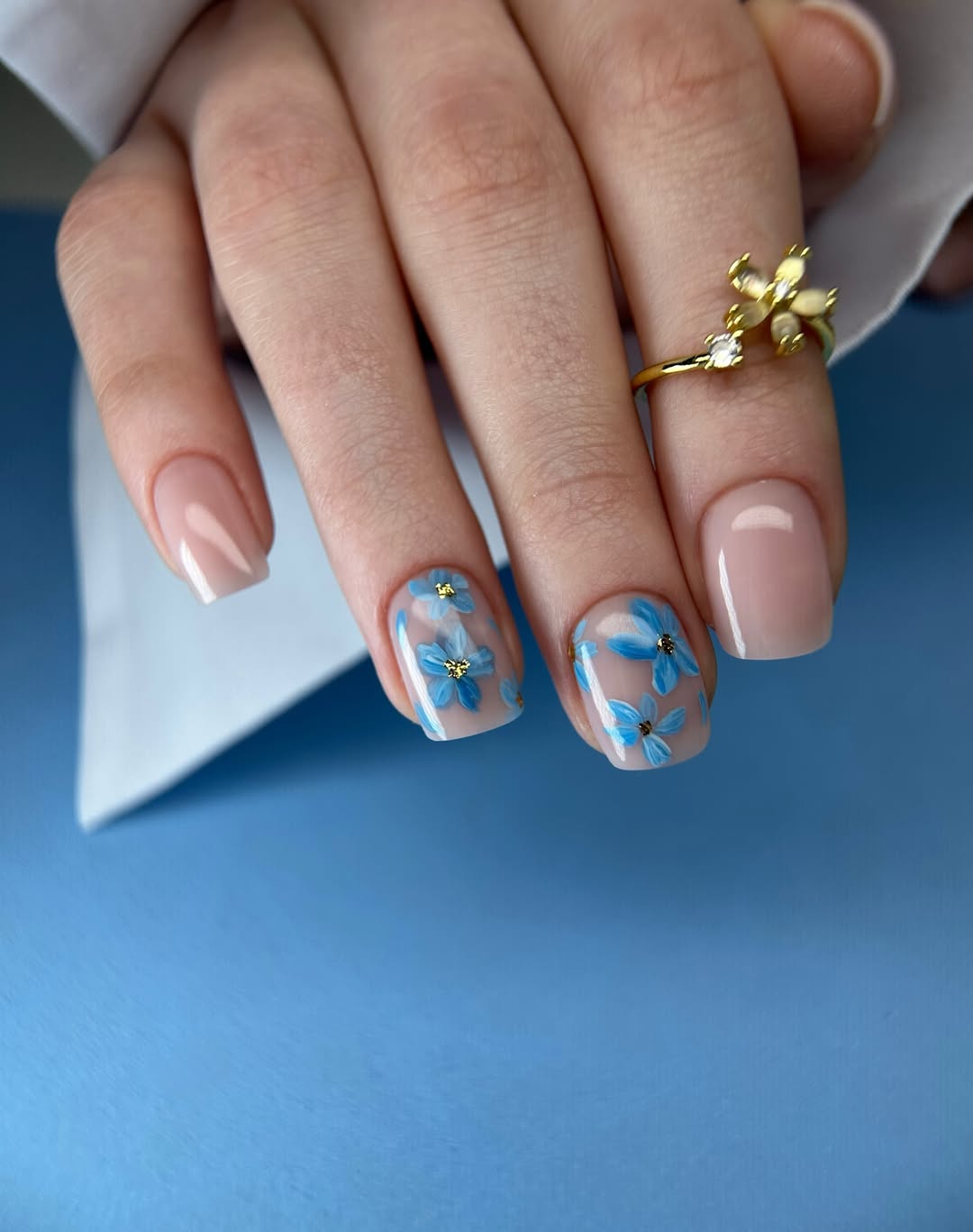 Dainty Blue Floral Nail Art With Nude Base