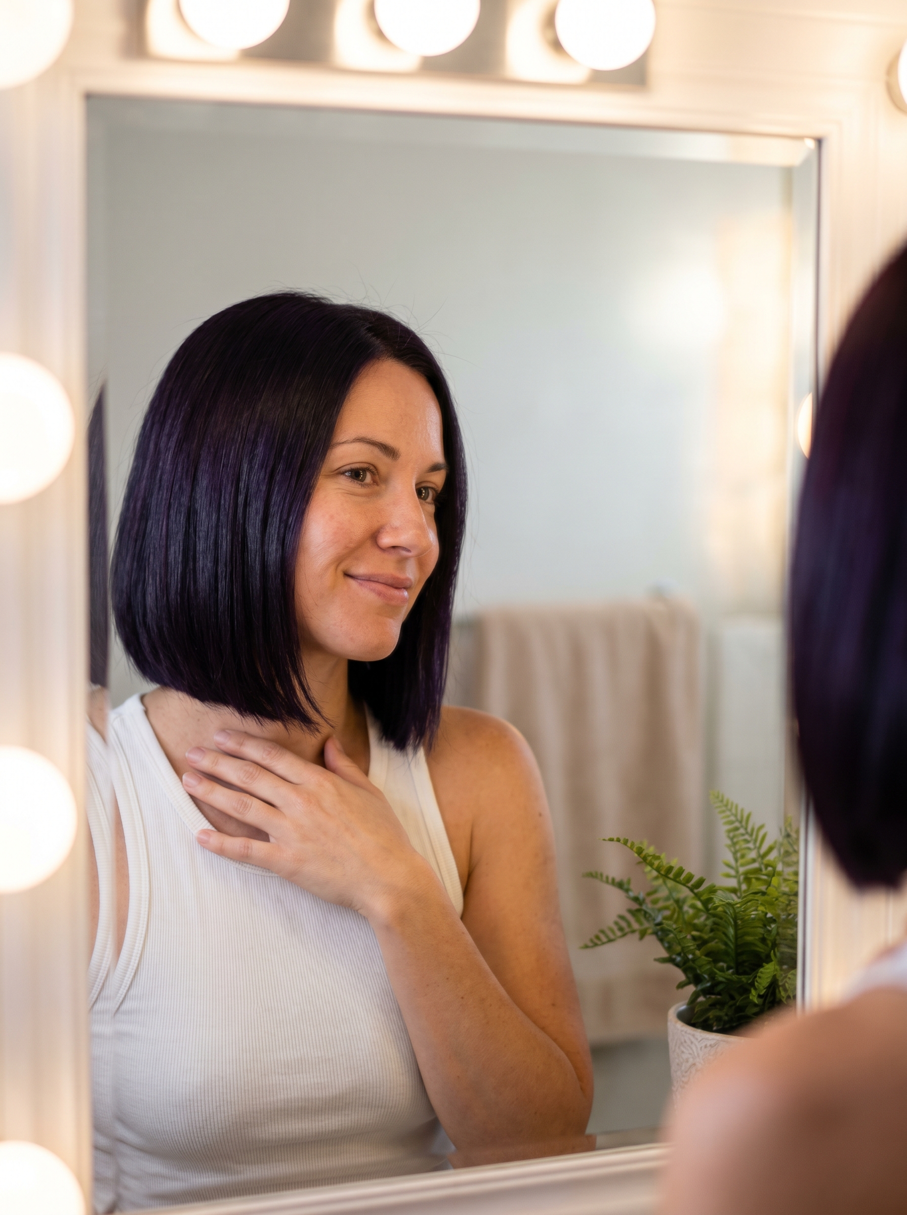 Violet-Black Blunt Bob: Edgy Dark Hair Summer 2026 Glam A sleek violet-black blunt bob, a glamorous edgy dark hair summer 2026 style with deep plum undertones. Perfect for work or special events, styled with heat protectant and a flat iron.