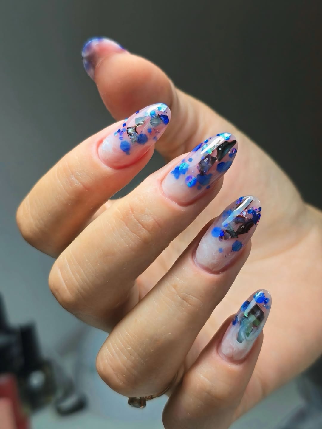 Encapsulated Blue Glitter Abstract Oval Nails with Foil