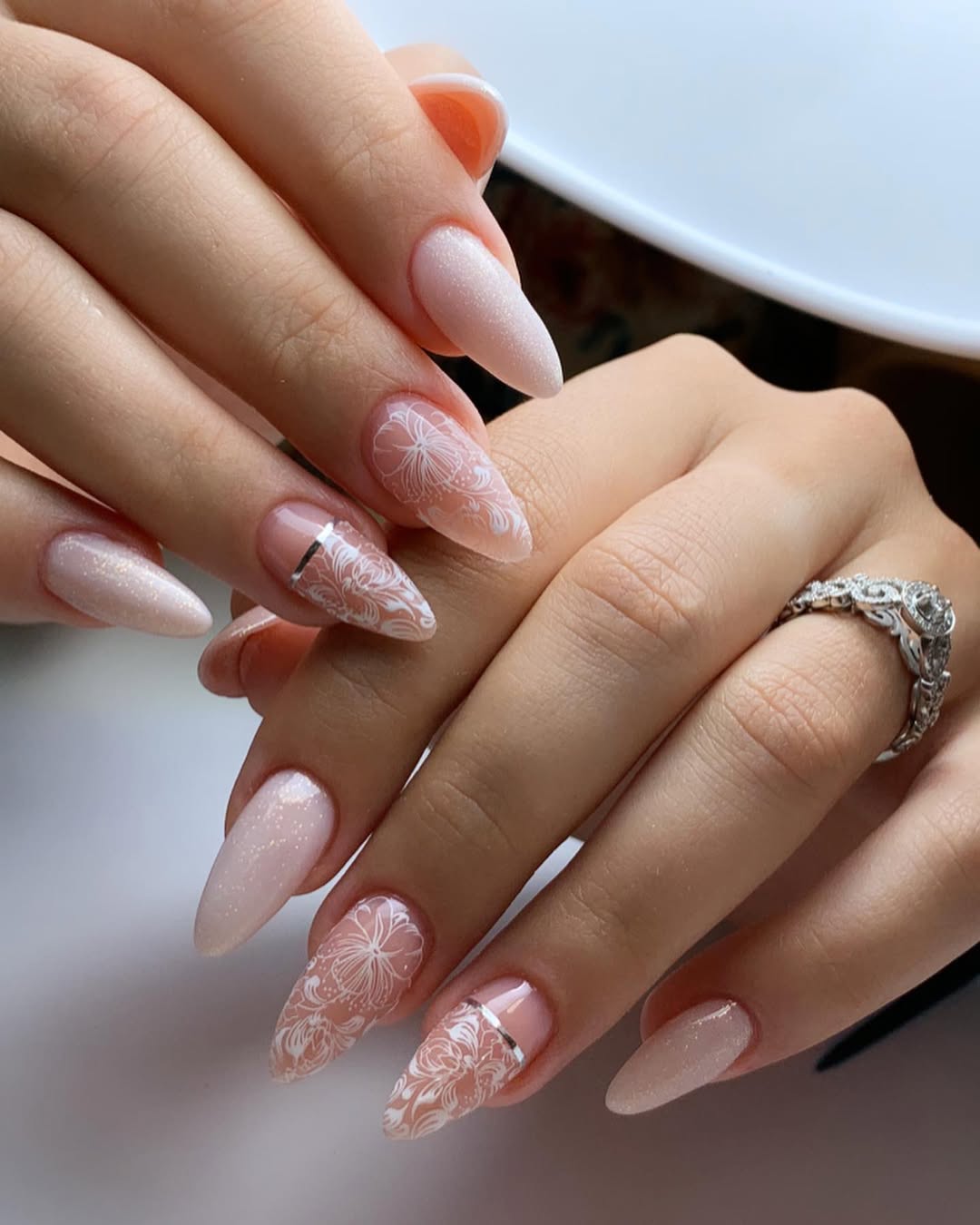 Floral Lace Almond Nails with Silver Accent