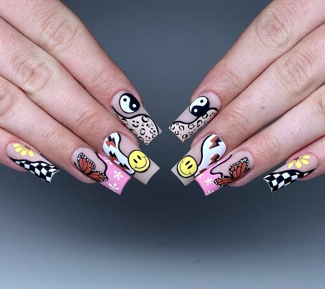 Funky Mismatched Nude Coffin Nails with Art