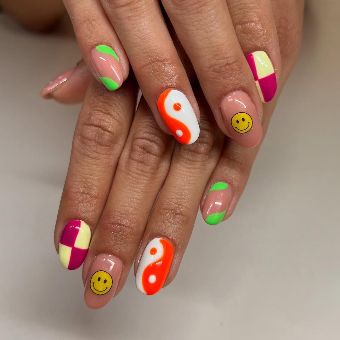 Funky Mismatched Smiley Face and Yin Yang Nails