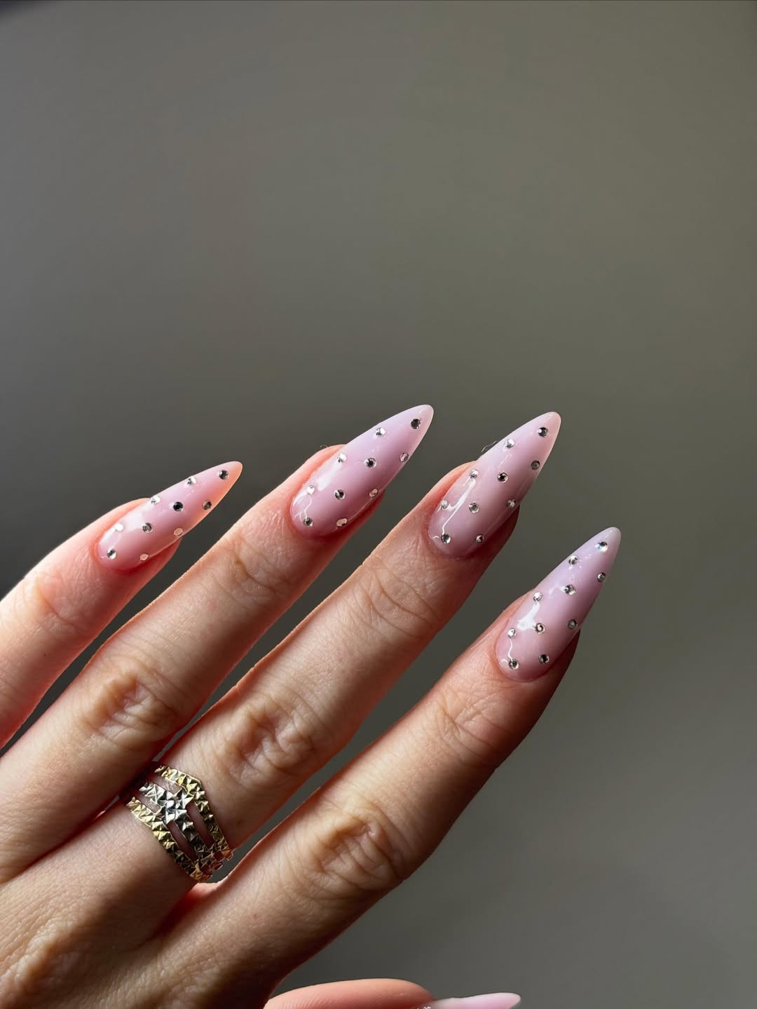 Glamorous Pink Stiletto Nails with Dotted Rhinestones