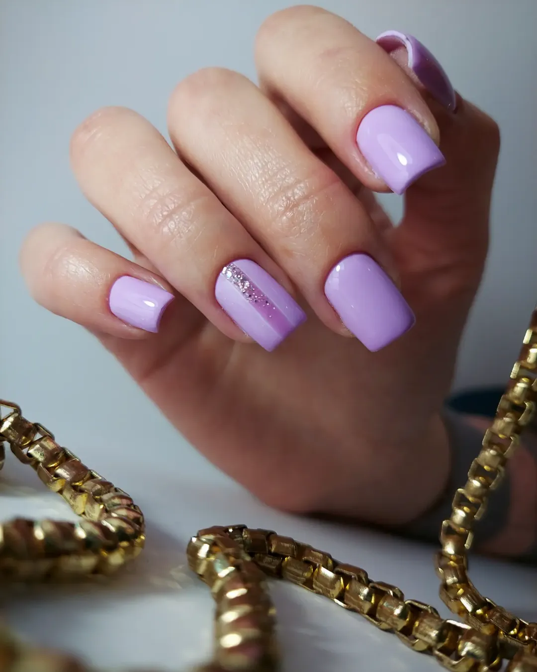 Glossy Lilac Square Nails with Glitter Stripe Art