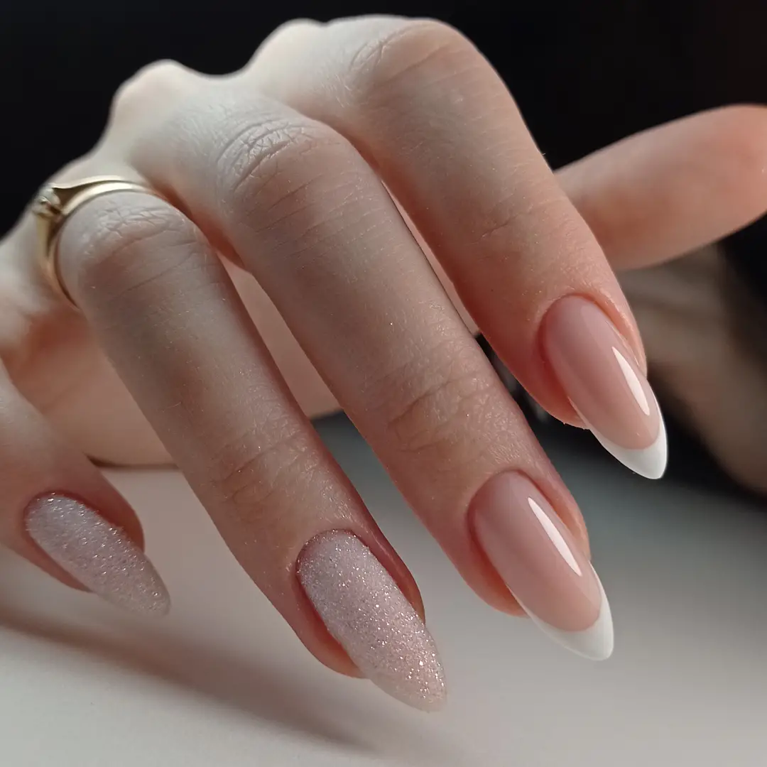 Glossy Nude French Tips With Glitter Accent Nails
