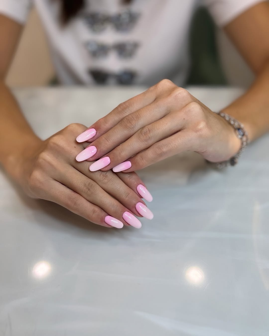 Glossy Pink and White Ombré Almond Nails