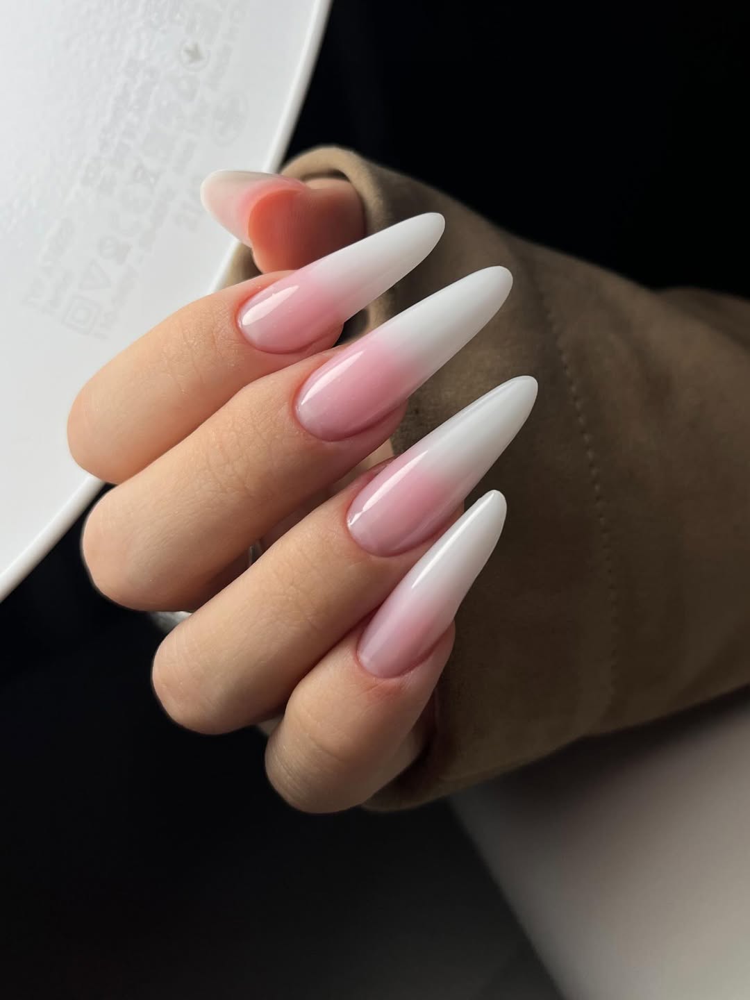 Glossy Pink to White Ombre Stiletto Nails