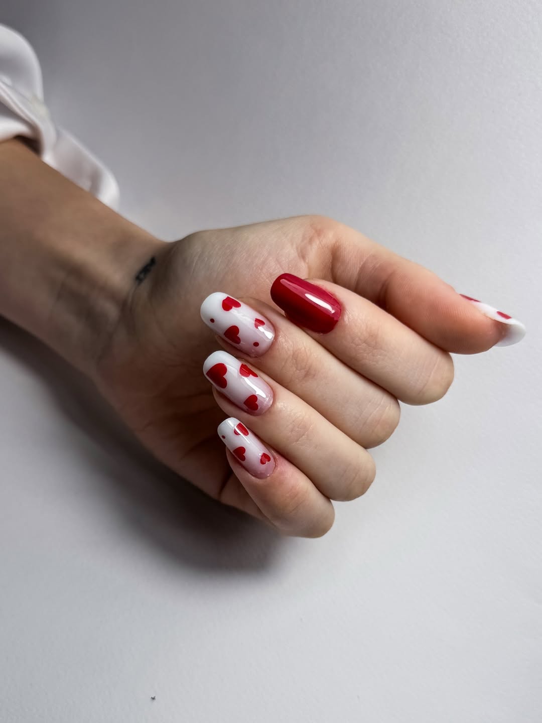 Glossy Red Heart Accent Oval Nails