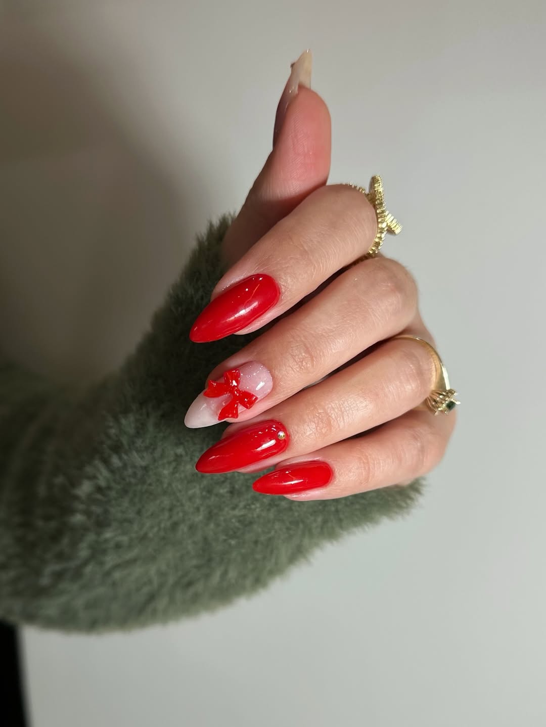 Glossy Red Stiletto Nails With 3D Bow Accent