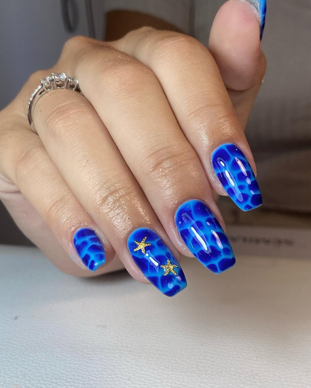 Glossy Royal Blue Water Ripple with Gold Starfish