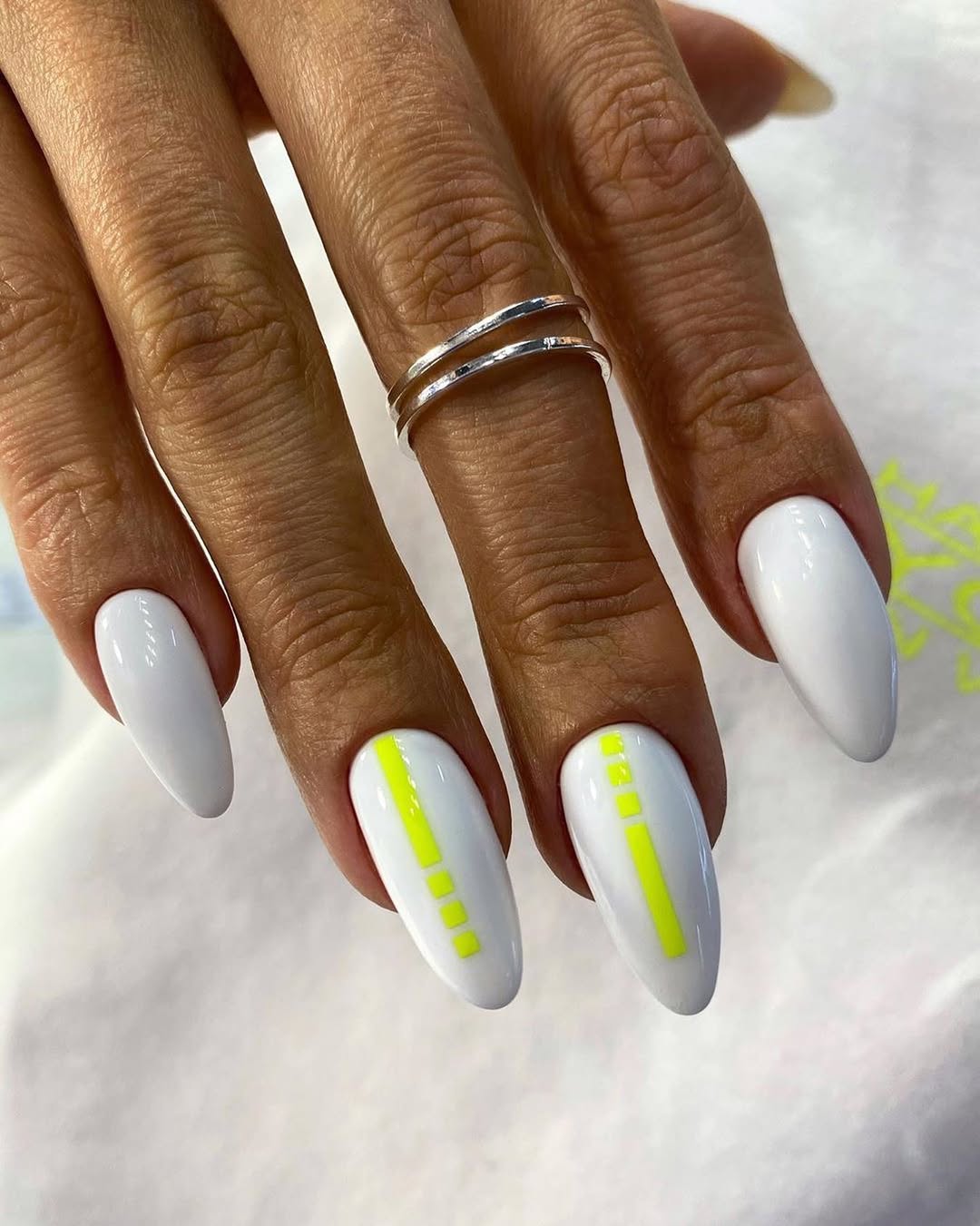 Glossy White Almond Nails With Neon Yellow Line Art