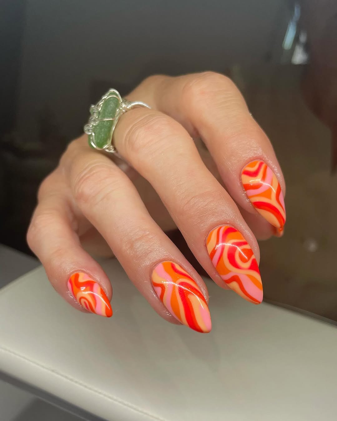 Groovy Orange Pink Swirl Stiletto Nails