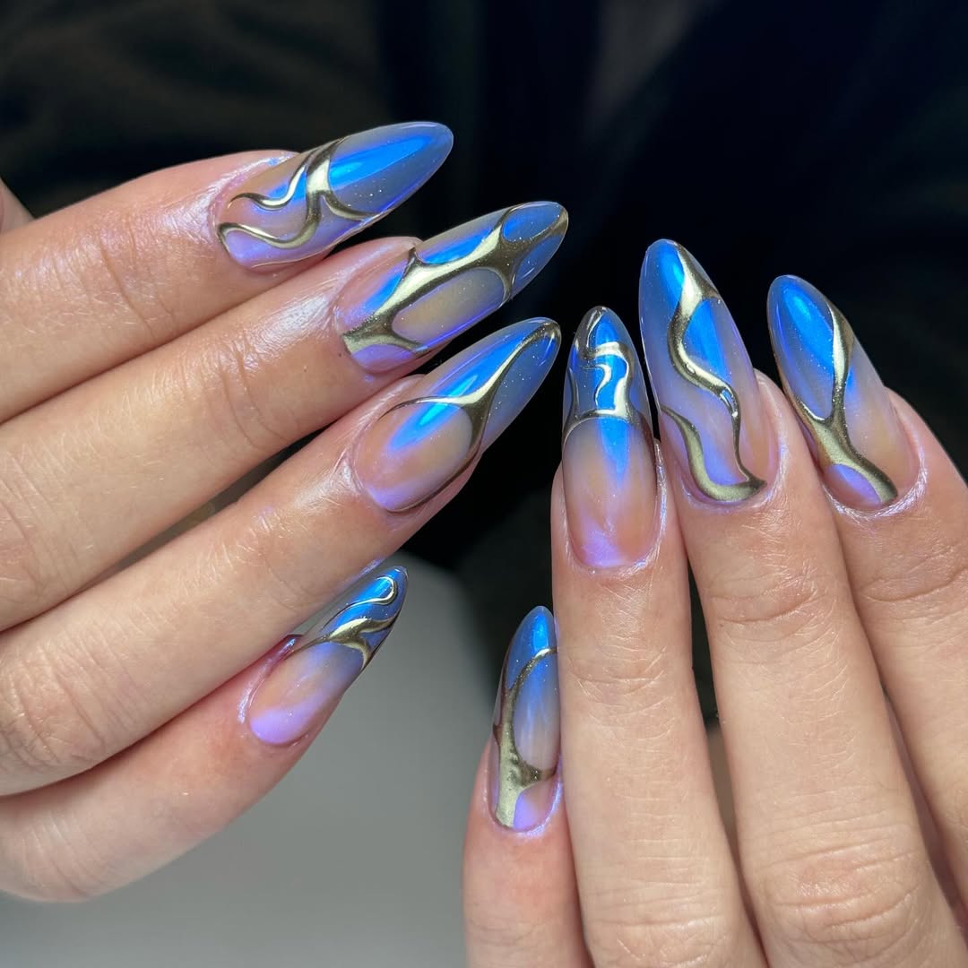 Iridescent Blue Gold Swirl Stiletto Nails