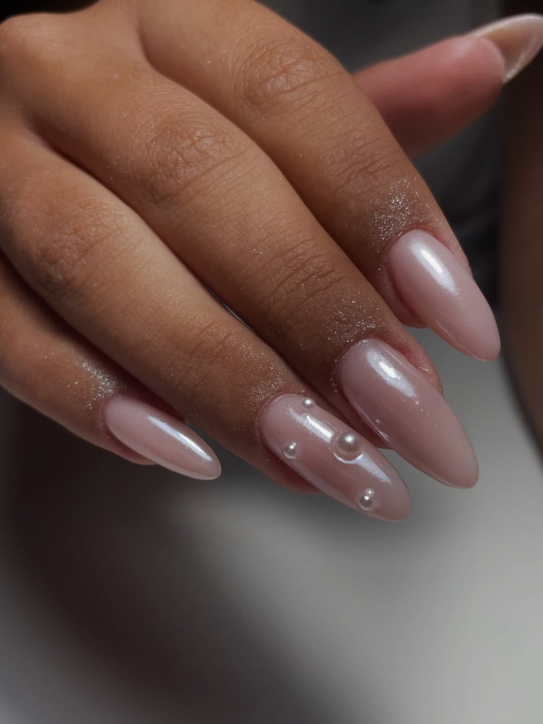 Iridescent Nude Almond Nails With Pearl Accents