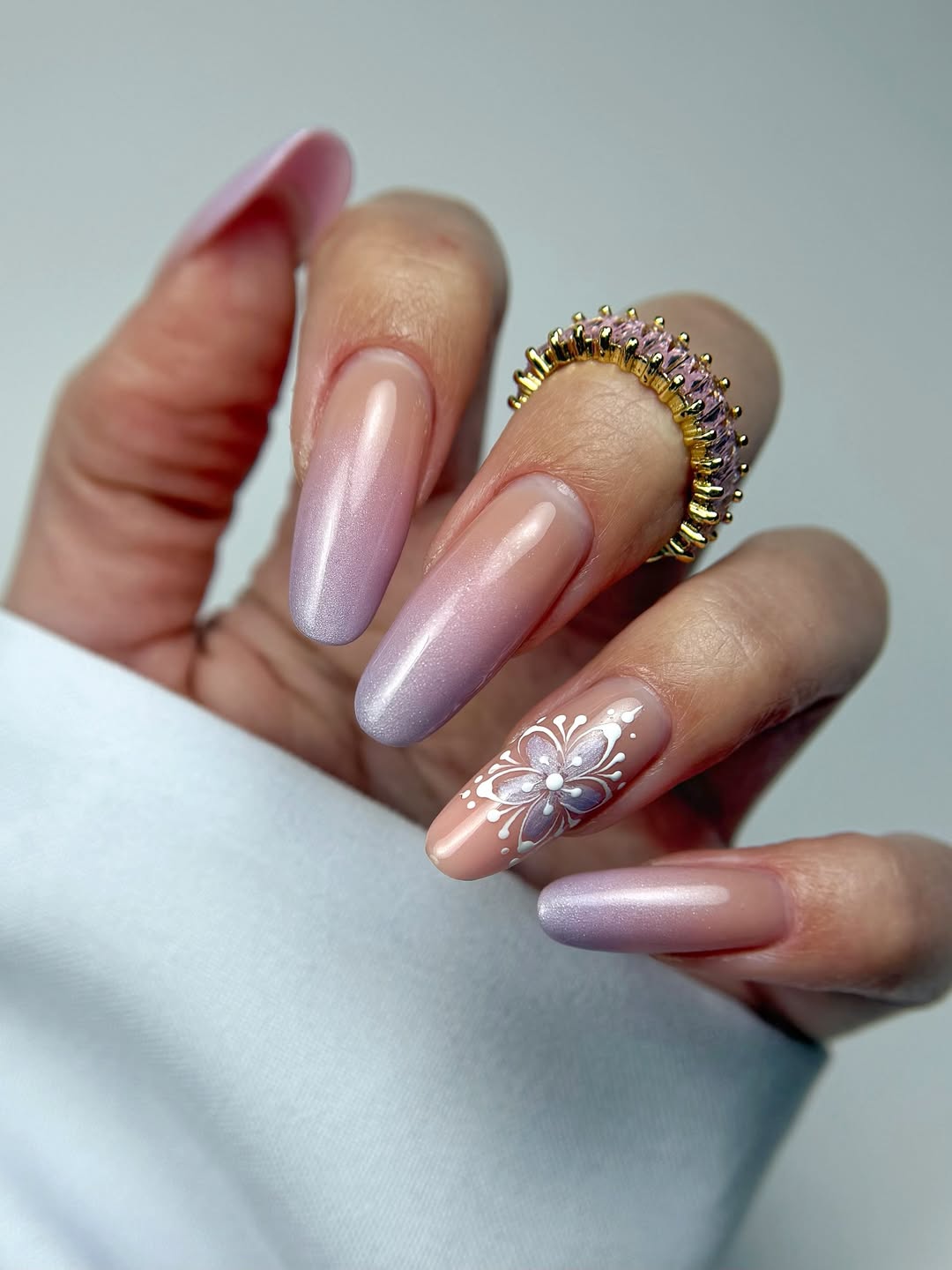 Lavender Shimmer Ombre Nails With Floral Accent