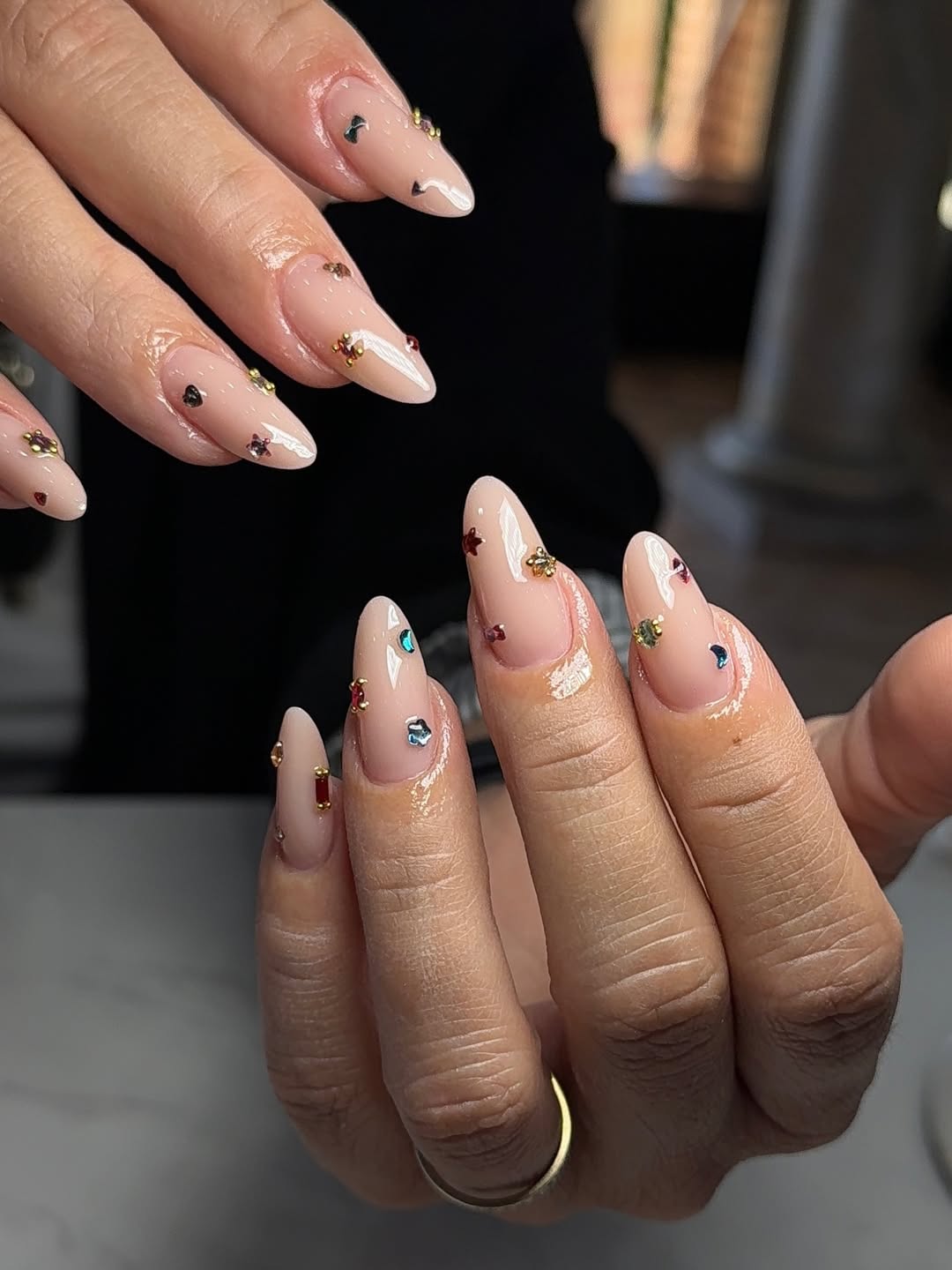 Long Nude Almond Nails With Colorful Rhinestone Charms
