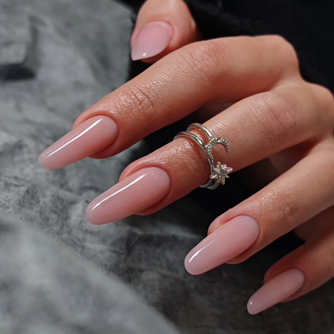 Long Soft Pink Glossy Oval Nails