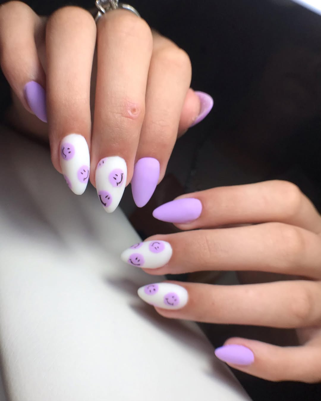 Matte Lilac Almond Nails With Purple Smileys