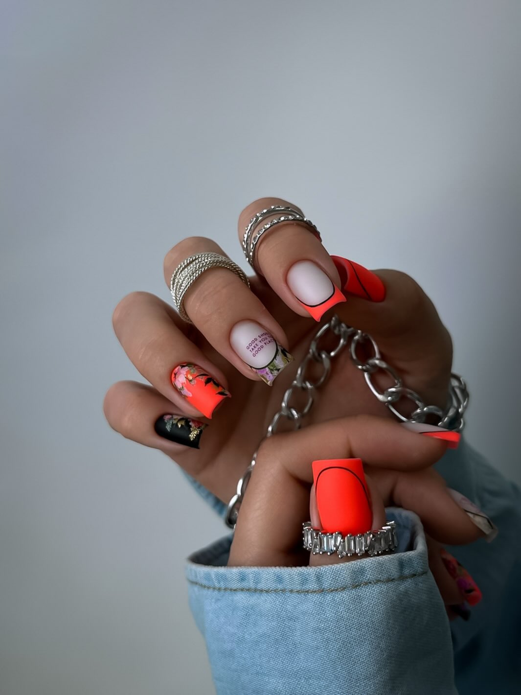Matte Neon Coral Floral Coffin Nails with Abstract Art