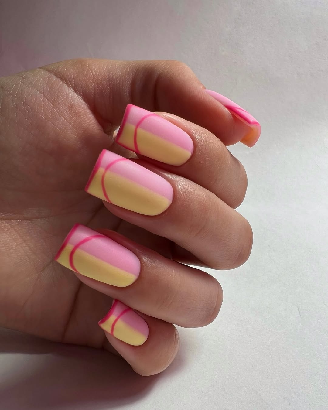 Matte Pink Yellow Abstract Swirl Nails