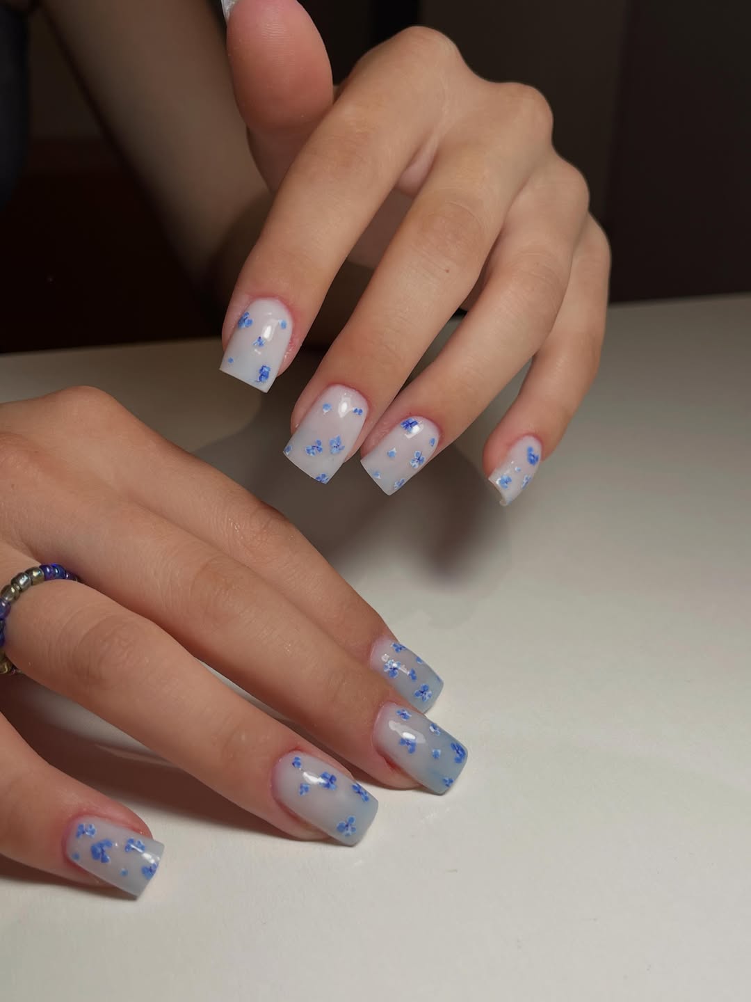 Milky White Blue Floral Square Summer Nails