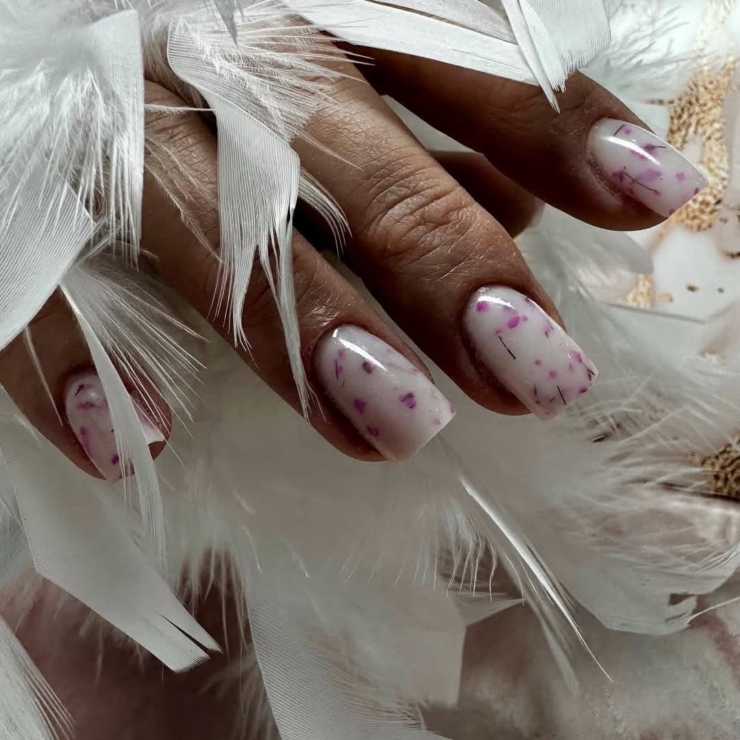Milky White Glossy Nails With Purple Flakes