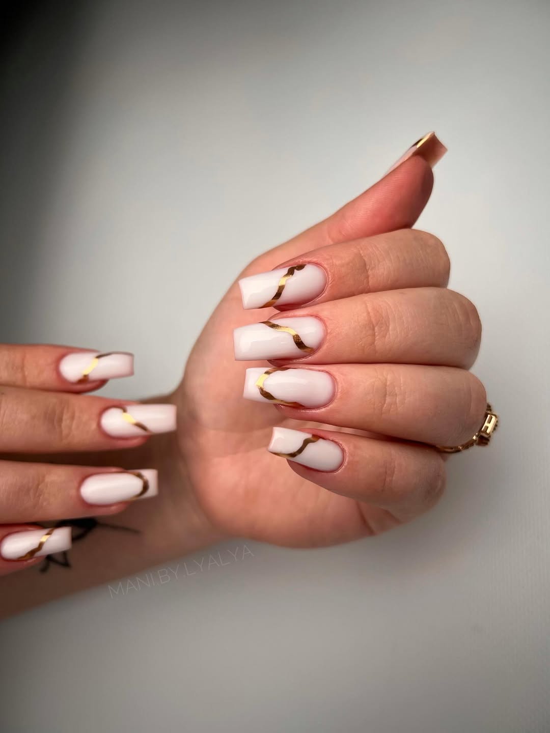 Milky White Gold Swirl Square Nails