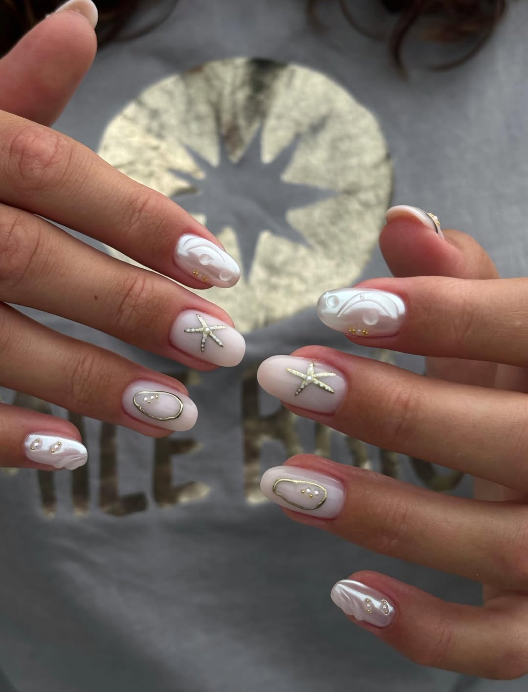 Milky White Iridescent Pearl Ocean Nails with Gold Accents