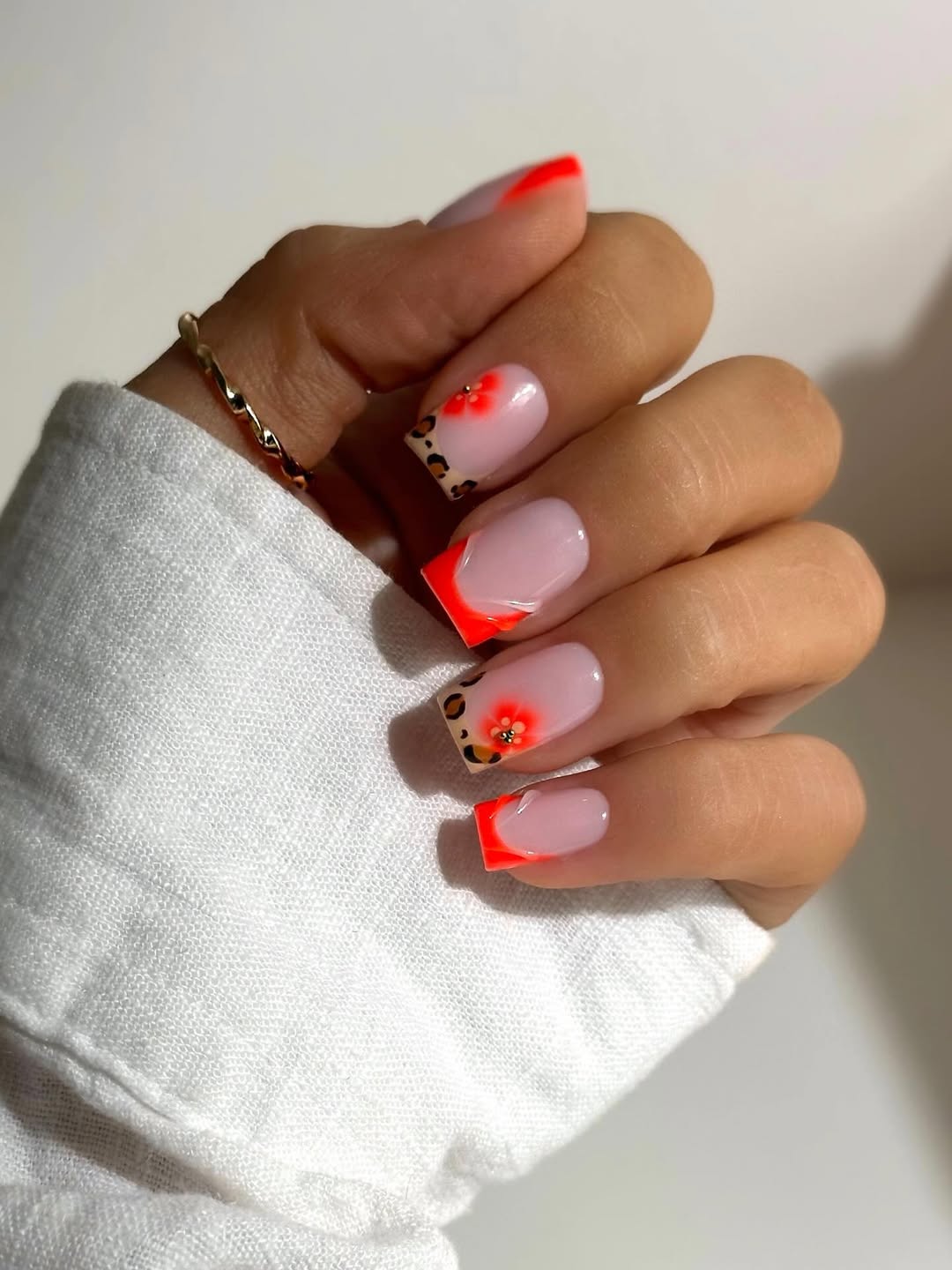 Neon Orange Leopard French Tips With Floral Accent