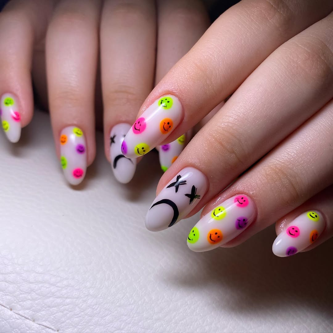 Neon Smiley Face And Sad Face Almond Nails