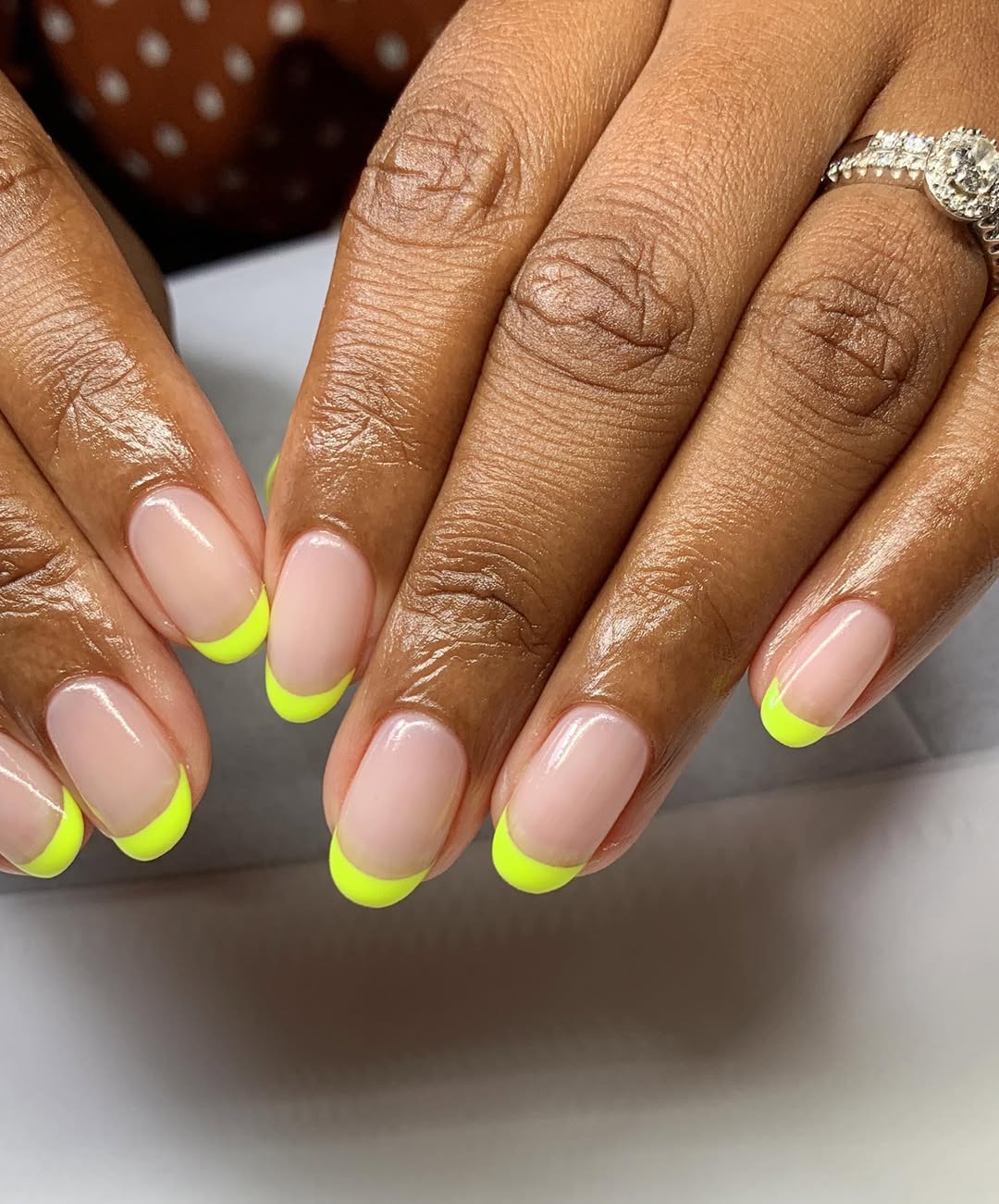 Neon Yellow French Tip Oval Manicure