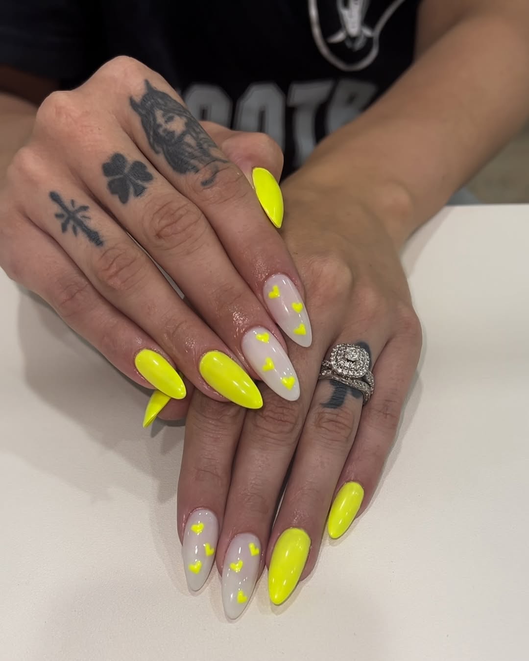 Neon Yellow Hearts on Milky White Almond Nails