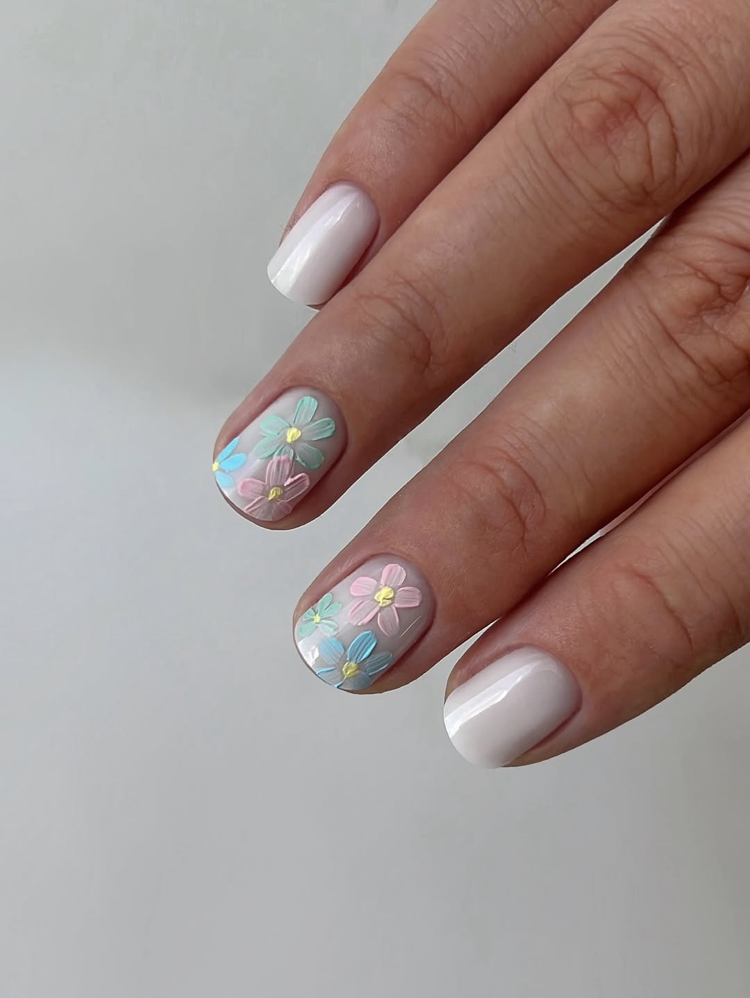 Pastel Floral French Tips On Milky White Nails