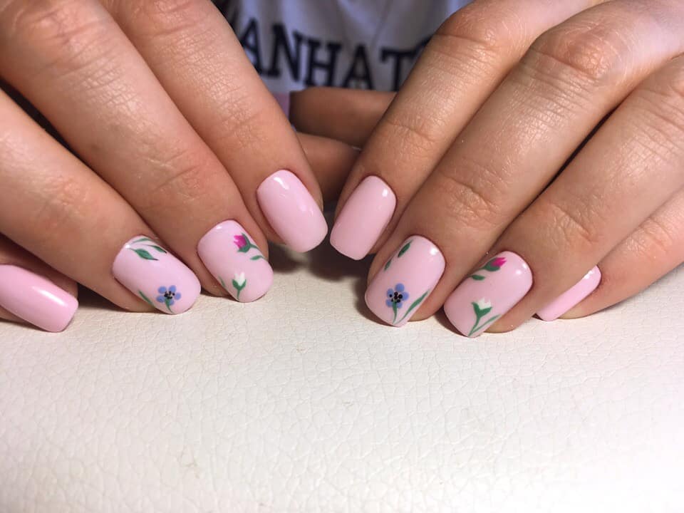 Pastel Pink Nails With Delicate Floral Accents